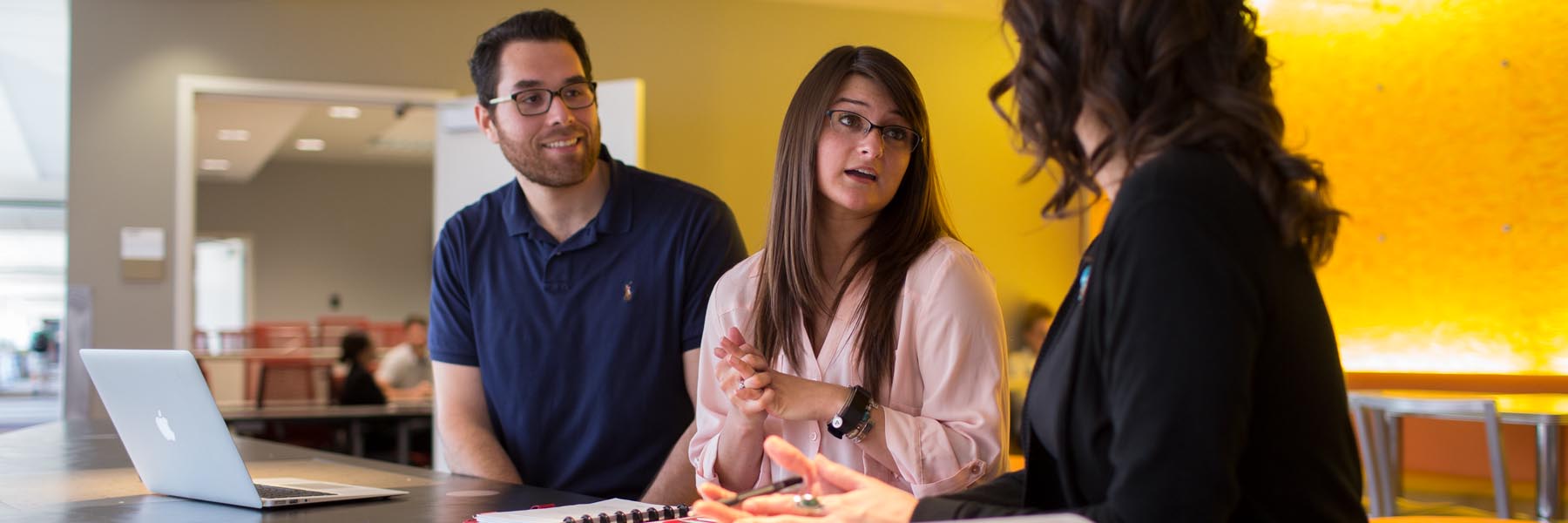 SPEA graduate students discuss a class.
