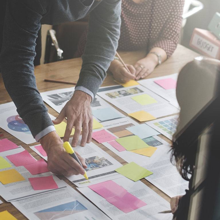 Employees collaborating on a project.