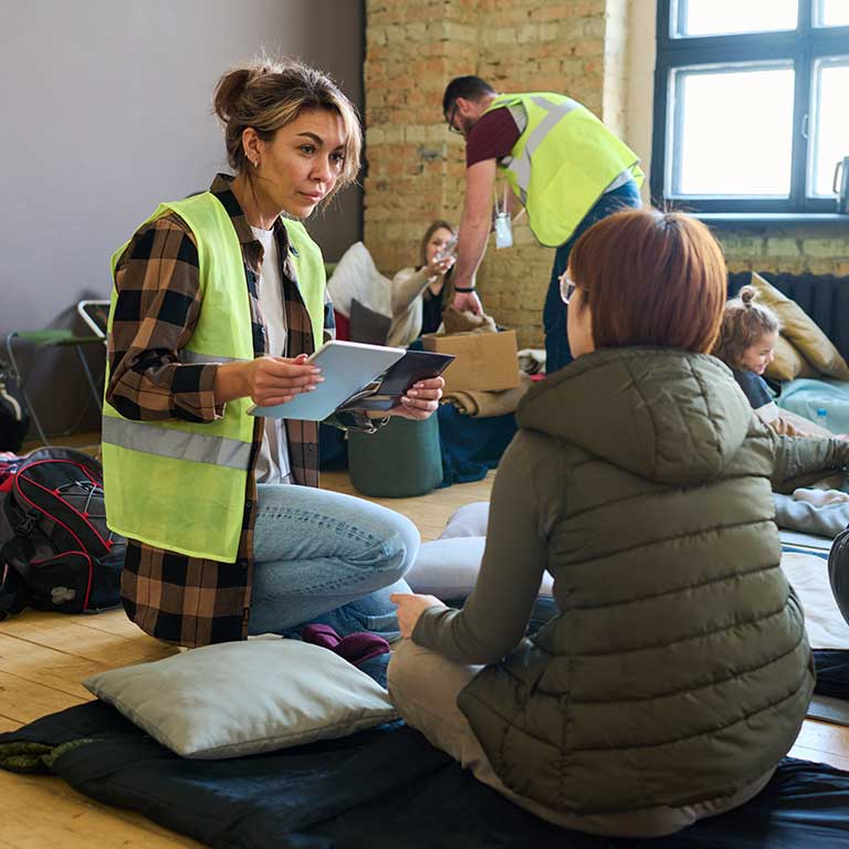 Stock photography of people in a homeless shelter.