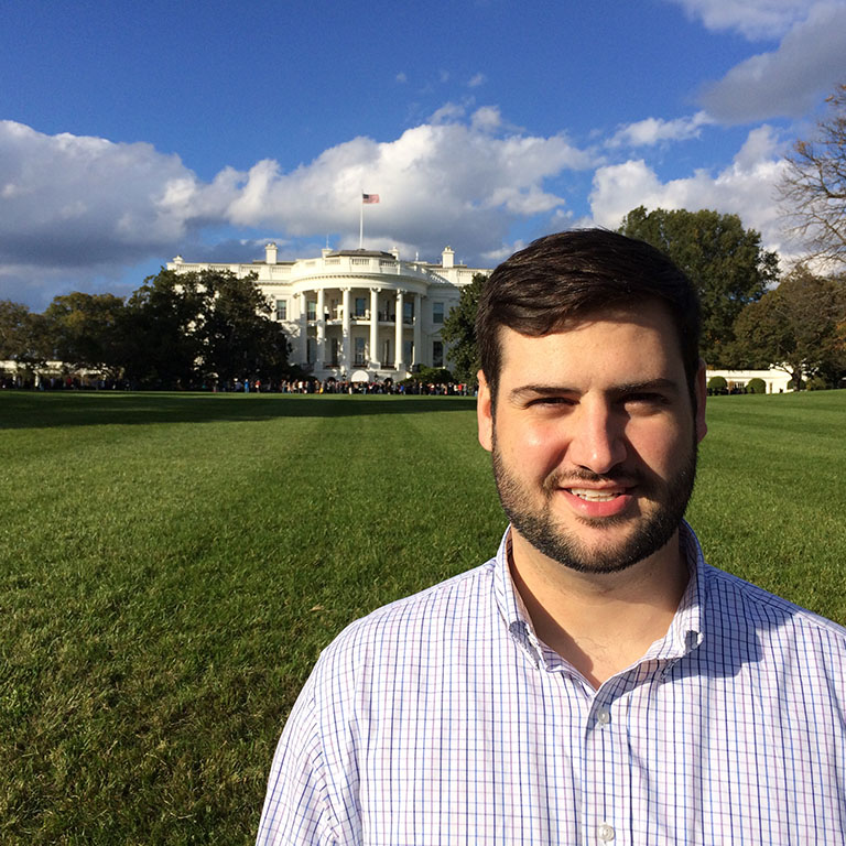 A SPEA student stands in front of the White House in Washington D.C.